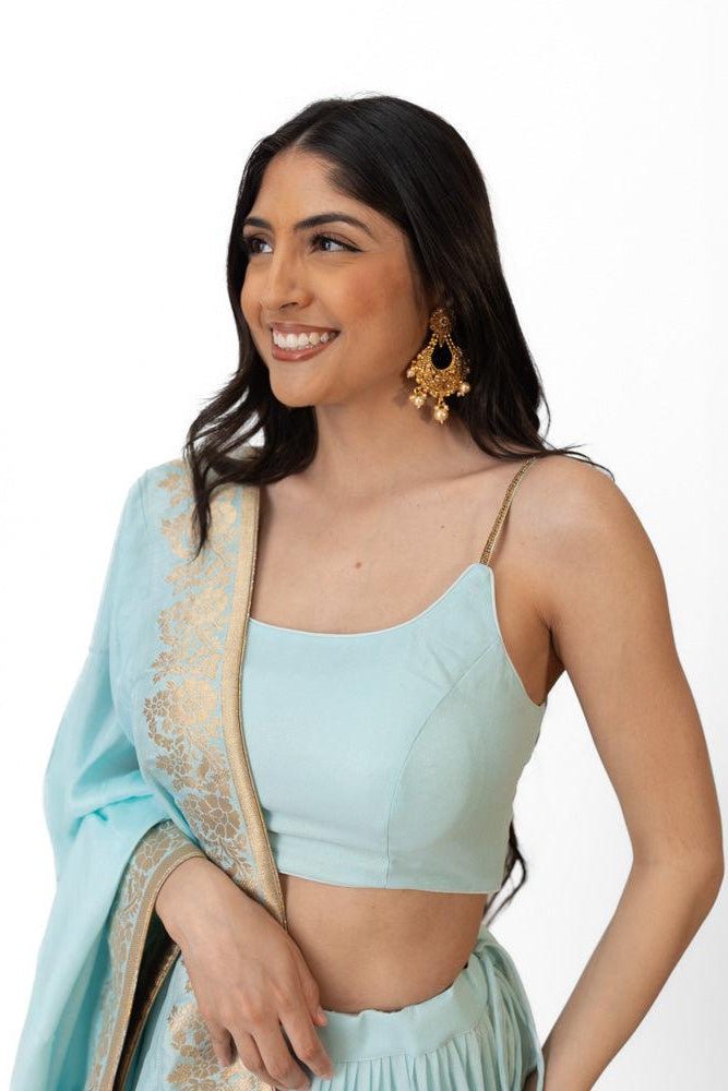 Elvia Sky Blue Shimmer Tiered Lehenga Choli Set with Gold Accents