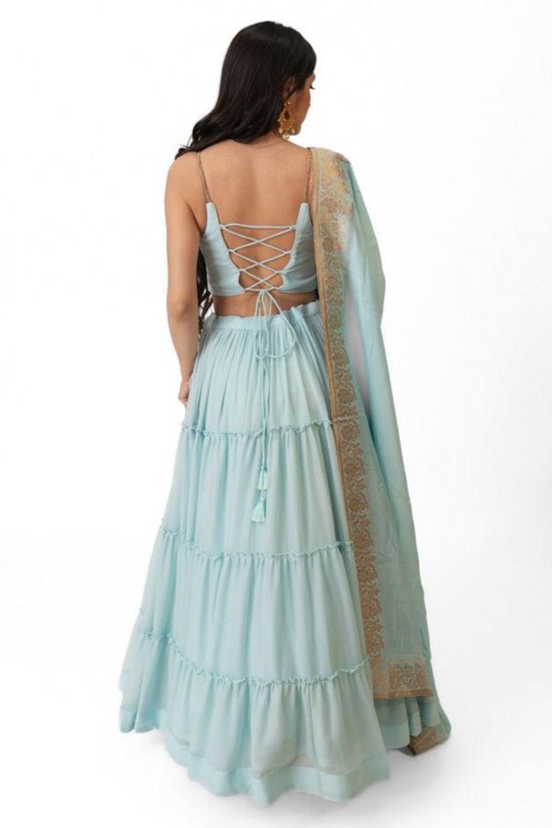 Elvia Sky Blue Shimmer Tiered Lehenga Choli Set with Gold Accents