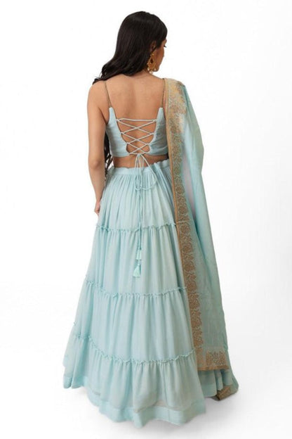 Elvia Sky Blue Shimmer Tiered Lehenga Choli Set with Gold Accents