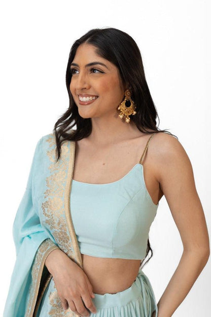 Elvia Sky Blue Shimmer Tiered Lehenga Choli Set with Gold Accents