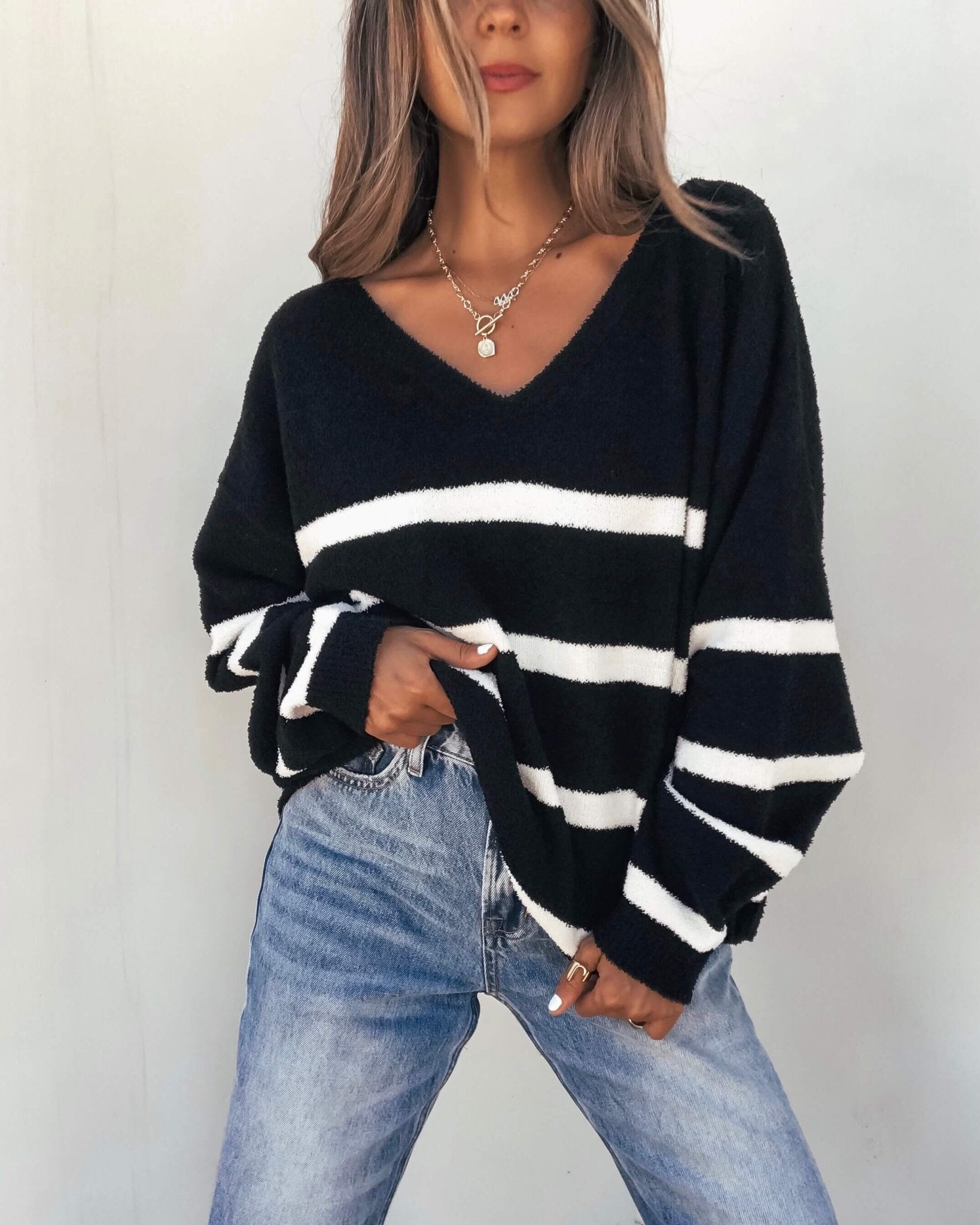 Black and White Striped V Neck Sweater - The Avenue44
